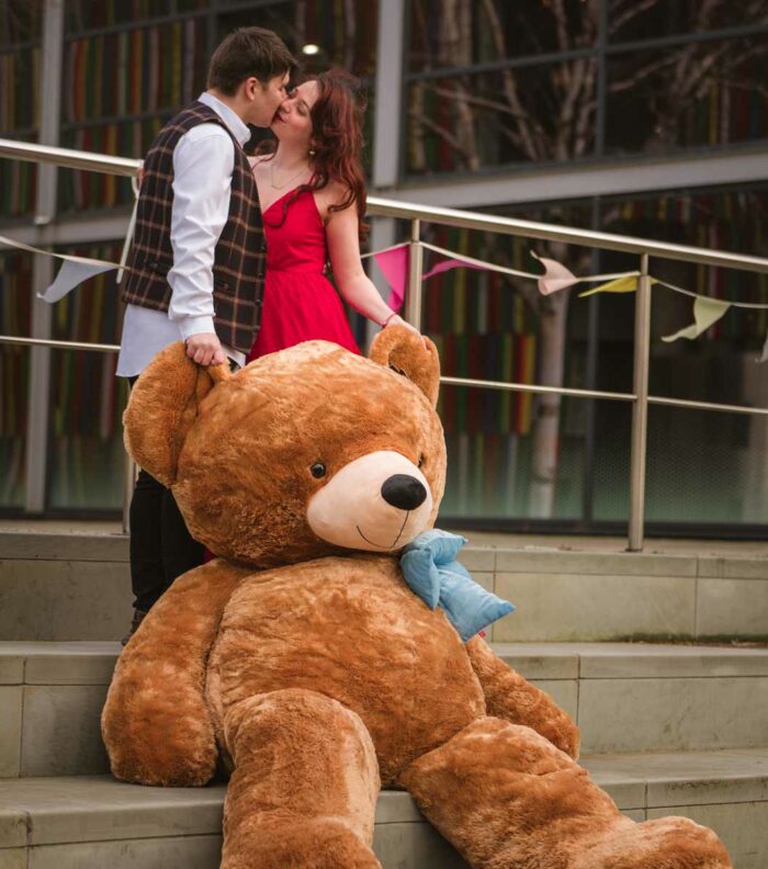 couple kissing in love romantic teddy bear gift