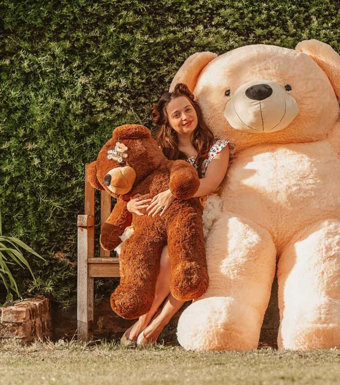 cute lady hugging her teddy bears