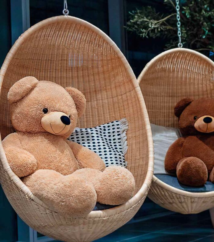 teddy bears on swinging chair bigted